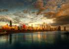 Chicago skyline over lake Michigan as sunrise enters a new day Art Print